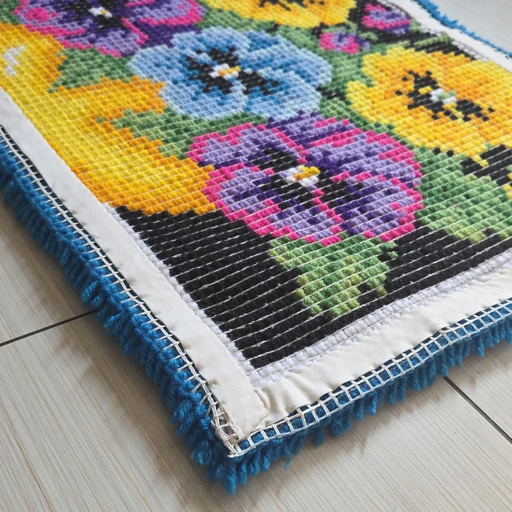 Completed Caron Wonderart Pot of Pansies Rug